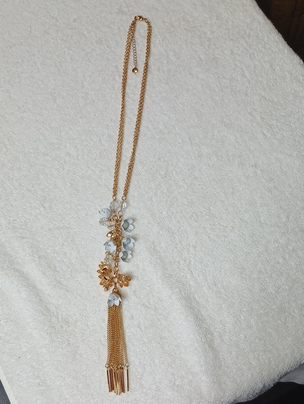 Gold Tone Floral Tassel Pendant Necklace with White Accents